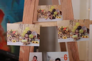 A wooden easel with pictures on it.